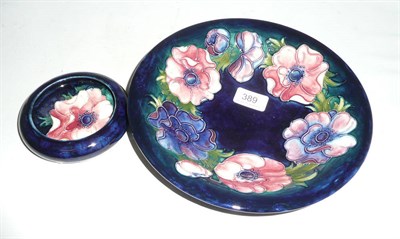 Lot 389 - A Moorcroft shallow bowl and small dish