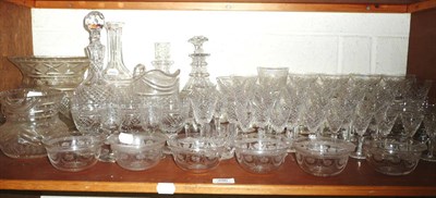 Lot 396 - Shelf of assorted cut glass decanters and stoppers, various glasses etc