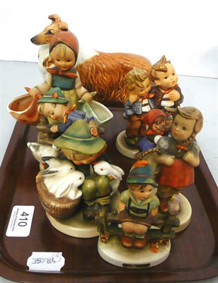 Lot 410 - Beswick dog and seven assorted Hummel figures