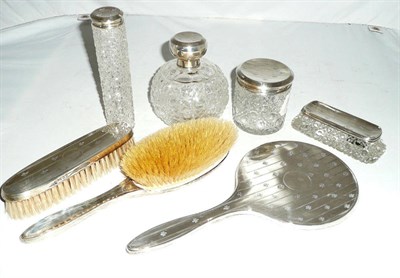 Lot 411 - Seven piece silver-backed dressing table set