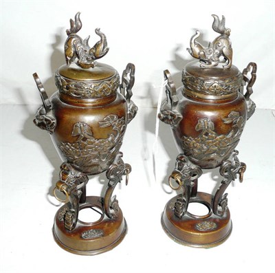 Lot 427 - Pair of Japanese vases and covers