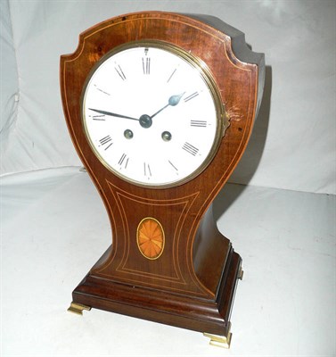 Lot 429 - A mahogany striking mantel clock