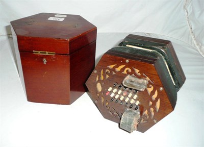 Lot 430 - A Louis Lachenal forty eight key English System hexagonal concertina, No.8459, with fretwork...