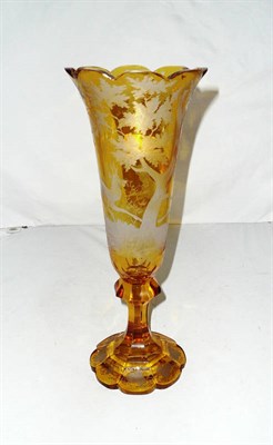 Lot 432 - Yellow glass overlay trumpet vase decorated with a stag and a hunting dog