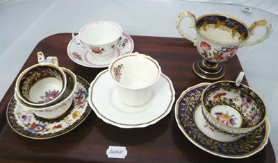 Lot 435 - Rockingham floral cup and saucer and other 19th century decorative cups and saucers