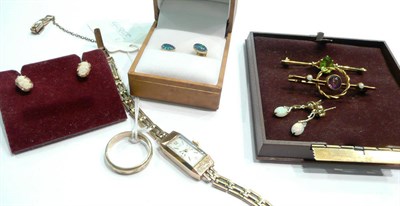 Lot 441 - A band ring, a watch, brooches and earrings