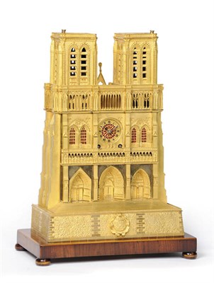 Lot 1322 - An Ormolu Striking Mantel Clock, circa 1840, the case depicting Notre Dame cathedral, the...