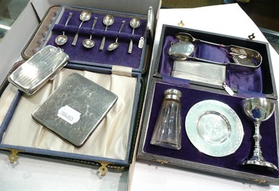 Lot 448 - Three silver vesta cases, two silver card cases, silver purse, silver sugar tongs with...