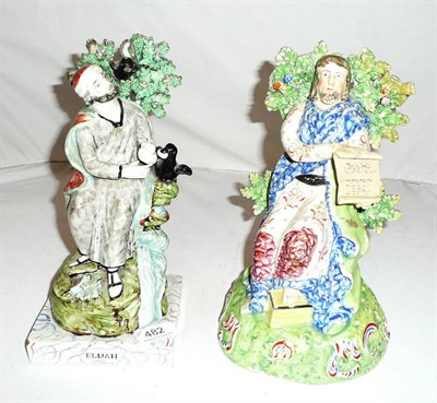 Lot 482 - Two early 19th century Staffordshire pottery figures, Elijah and Christ Teacheth John 3 Ch. 3