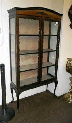 Lot 580 - Walnut glazed china cabinet