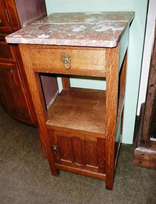 Lot 595 - Pair of oak bedside cabinets with marble tops