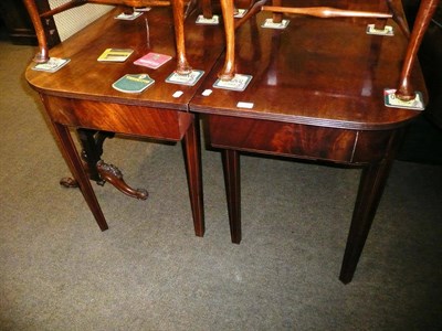 Lot 623 - A 19th century mahogany D-end dining table missing leaves