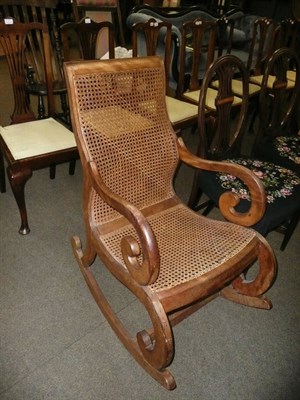 Lot 647 - Mahogany framed caned rocking chair