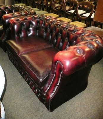 Lot 651 - Modern two seater Chesterfield and armchair