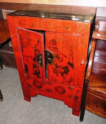 Lot 681 - Eastern red lacquered cupboard