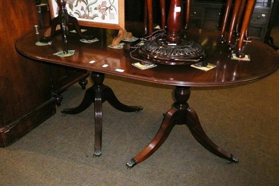 Lot 684 - Reproduction mahogany twin pedestal dining table