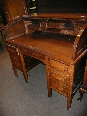 Lot 704 - Oak roll top desk