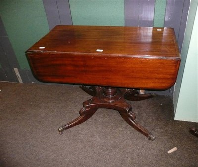 Lot 713 - Victorian mahogany table on a pedestal base