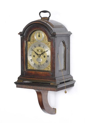 Lot 1353 - A Small Ebonised Striking Bracket Clock, the arched case with single pad top and brass carrying...