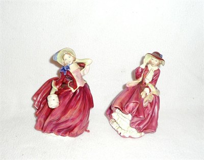 Lot 23 - Two Royal Doulton china figures 'Top O' The Hill' HN1937 and 'Autumn Breezes' HN1934