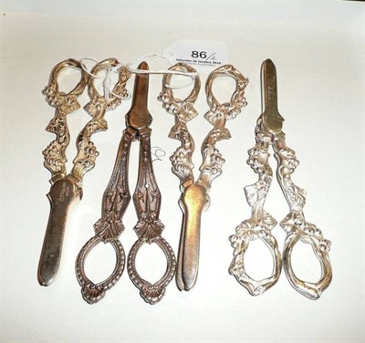 Lot 86 - Four pairs of silver plated grape scissors