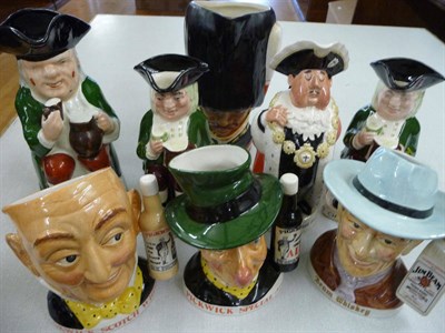 Lot 112 - Eight assorted advertising Toby jugs including Pickwick Special Ale, Beam Whisky, Charrington...