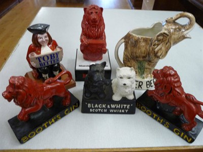 Lot 114 - Two plaster advertising figures, Booths, Gin, Black & White Scotch Whisky figure group and...
