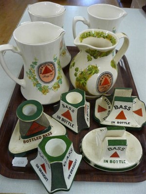 Lot 125 - Tray of Bass advertising items including four water jugs and five strikers/match box holders