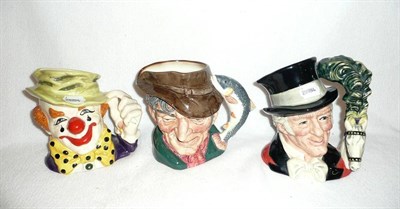Lot 157 - Three Royal Doulton large character jugs - 'Poacher', 'The Ringmaster' and 'The Clown'