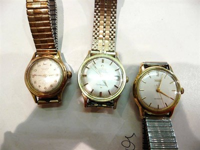 Lot 184 - A gilt and steel Omega wristwatch and two other gentlemen's wristwatches