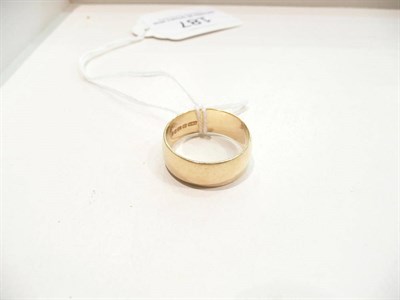 Lot 187 - An 18 carat gold wedding band, 5.9g approximately