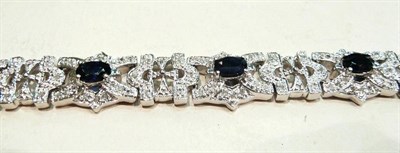 Lot 189 - 18 carat white gold sapphire and diamond bracelet, 32.5g approximately