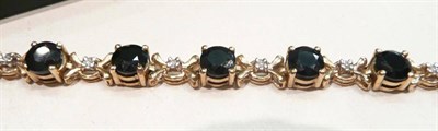 Lot 190 - 9 carat gold sapphire and diamond bracelet, 9.8g approximately