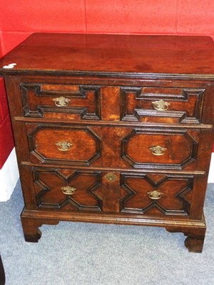 Lot 1386 - An Early 18th Century Joined Oak Chest of Drawers, the moulded top over three geometrically-moulded