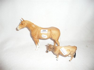 Lot 209 - Beswick Palomino and Jersey cow