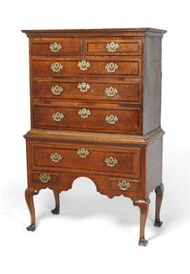 Lot 1387 - An 18th Century Oak Chest on Stand, the moulded and projecting cornice above two short and...