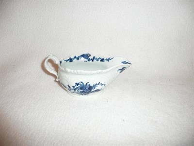 Lot 220 - An early Worcester blue and white porcelain sauce boat