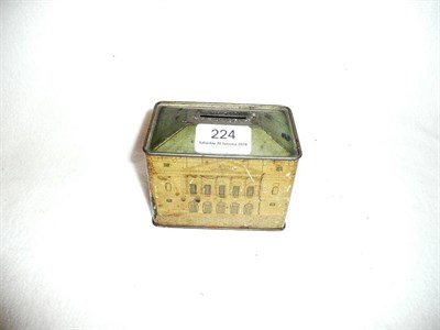 Lot 224 - The Queens Dolls House tinplate money box