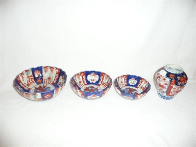 Lot 264 - Graduated set of three Imari bowls and a similar vase