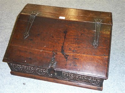 Lot 1393 - A 17th Century Oak Desk Box, of boarded construction, the slope with moulded edge enclosing a...