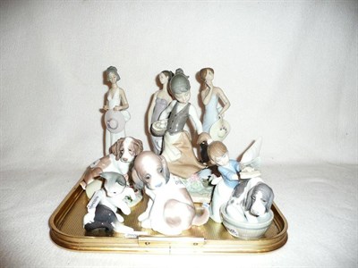 Lot 276 - Eight Lladro figures and seven boxes