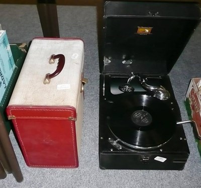 Lot 293 - An HMV table top wind-up gramophone, in black leather cloth case, with a case of 78's