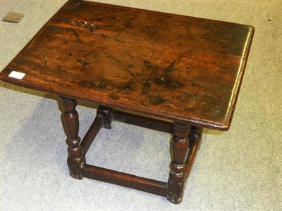 Lot 1395 - A Small Joined Oak Table, the moulded top on shaped rails and inverted baluster legs joined by...