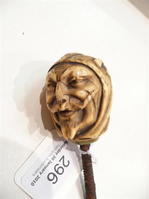 Lot 296 - 19th century bone walking stick pommel carved as the head Mephistopheles