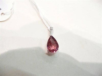 Lot 305 - An 18 carat white gold pink tourmaline and diamond pendant