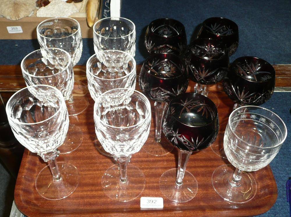 Lot 392 - A set of six ruby glass hock glasses; a set of six cut glass goblets and another