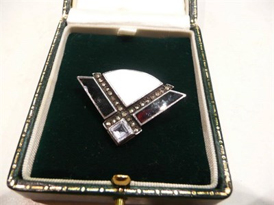 Lot 396 - An Art Deco silver fan brooch set with marcasites and an aquamarine-type stone