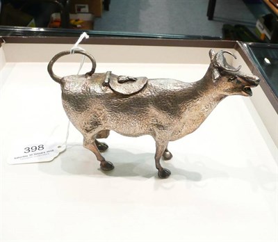 Lot 398 - A Continental white metal cow creamer, circa 1900, 10cm high