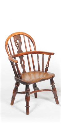 Lot 1409 - A 19th Century Yew, Cherry and Ash Child's Windsor Chair, the low double-bow back with pierced...