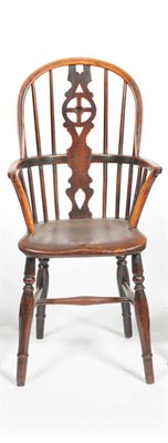 Lot 1410 - A 19th Century Ash, Elm and Beechwood Child's Windsor Chair, the high double-bow back with a...